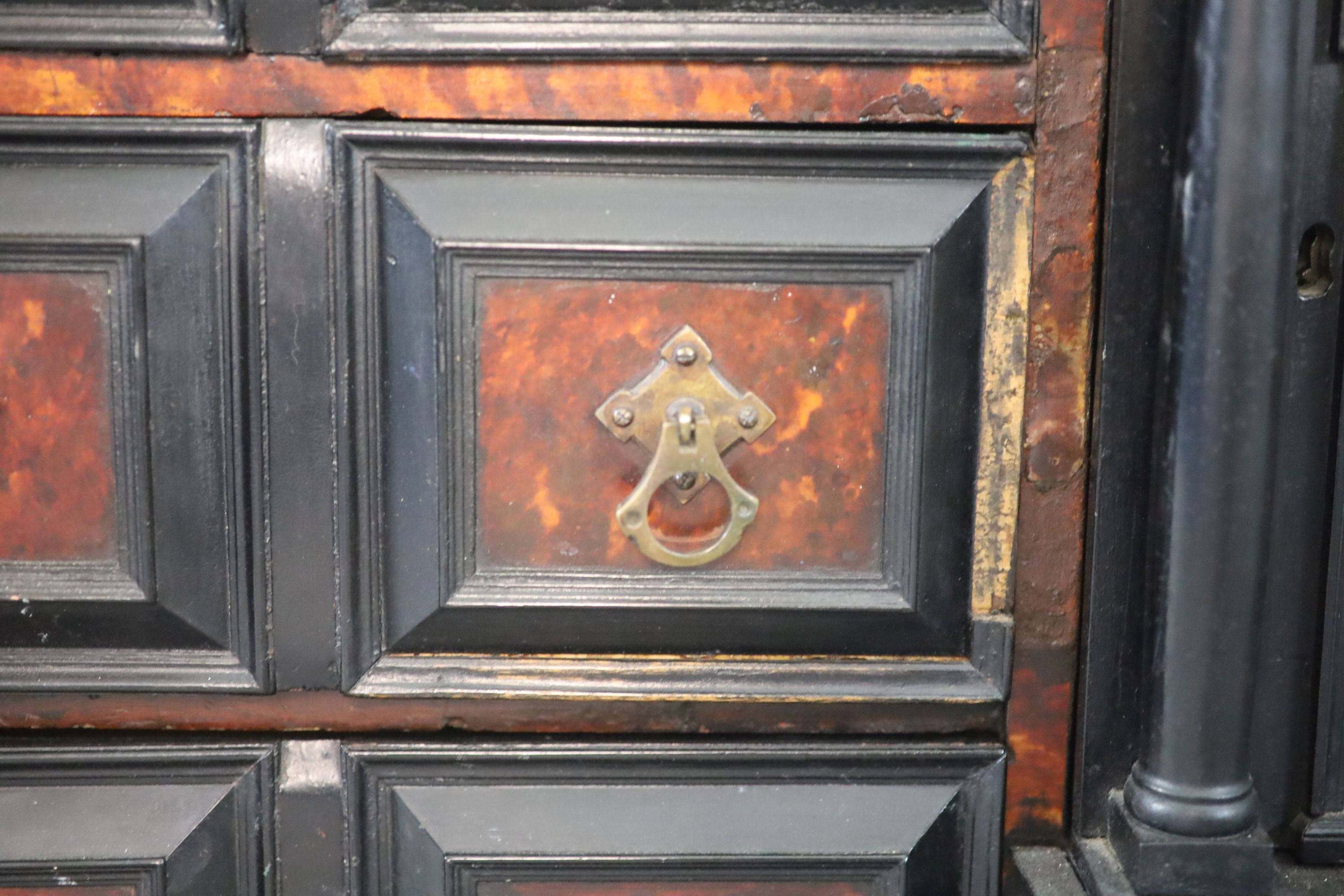 A late 17th century Portuguese ebony and tortoiseshell table cabinet, W.128cm D.39cm H.85cm